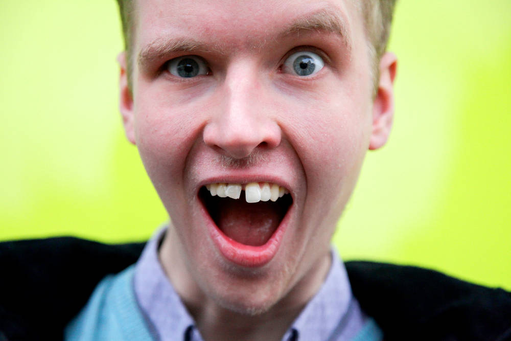 Young person with mouth wide open