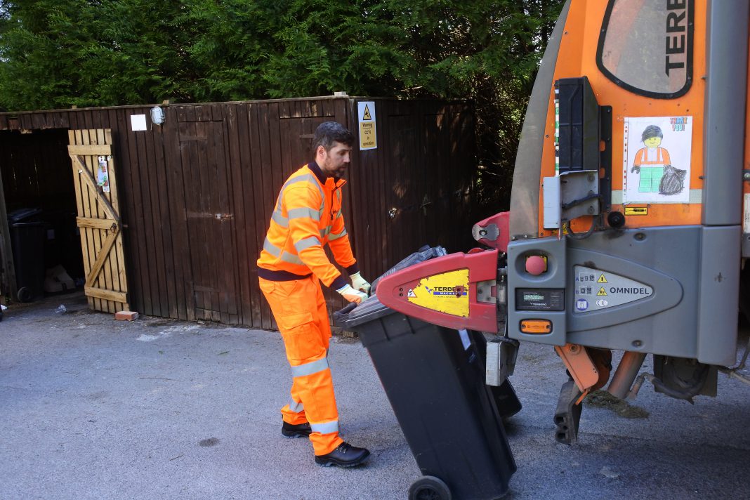 Cllr Toby Savage out with bin collections