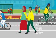 An animated image of people walking and cycling with people at a bus stop in the background
