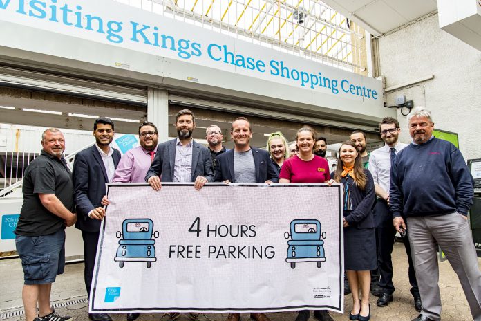 Representatives from the council and Kings Chase Shopping Centre celebrate the announcement of four hours free parking