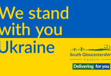 The colours of the Ukrainian flag with the wording We stand with you Ukraine