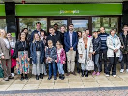 Leader of South Gloucestershire Council, councillor Toby Savage (centre front) with Ukrainian guests and staff involved in the employability workshops at Yate Job Centre Plus.