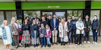 Leader of South Gloucestershire Council, councillor Toby Savage (centre front) with Ukrainian guests and staff involved in the employability workshops at Yate Job Centre Plus.
