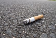 An image of a cigarette end in the road