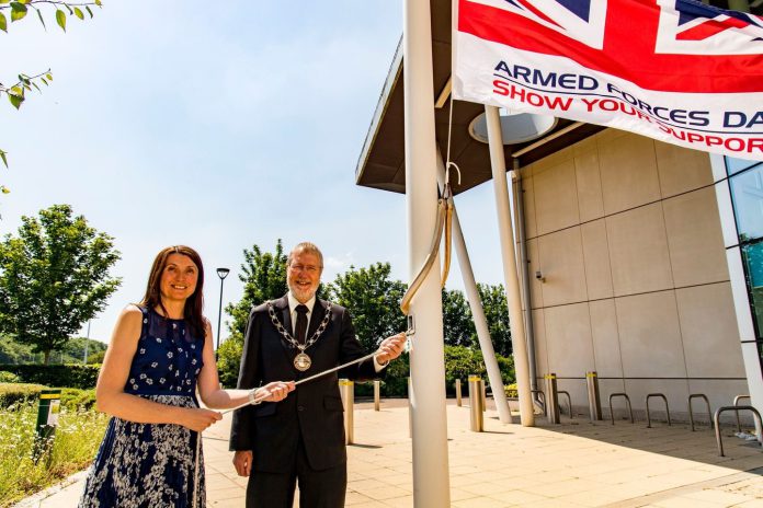 South Gloucestershire Council’s armed forces champion and cabinet member for cost of living, equalities and public health Councillor Alison Evans and Chair of South Gloucestershire Council Councillor Mike Drew at the council’s recent flag raising ceremony for Armed Forces Day