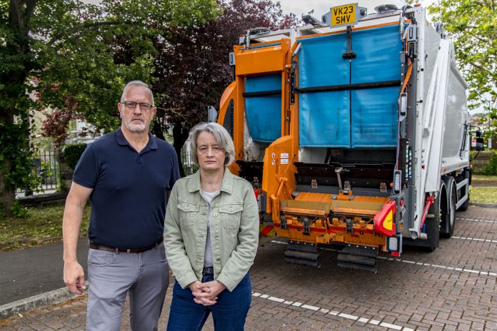 Cllr Ian Boulton and Cllr Claire Young stood near a recycling truck
