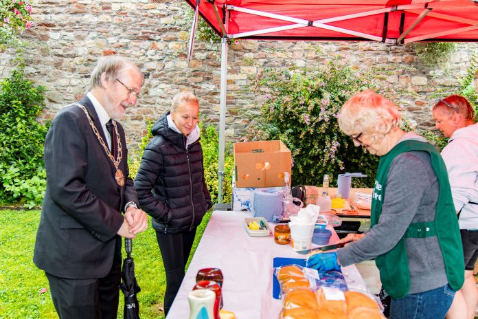 Chair of South Gloucestershire Council, Councillor Mike Drew with members of the Friends of Yate and District Heritage Centre.