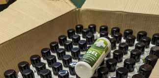 A box filled with bottles of seized fake hand sanitiser