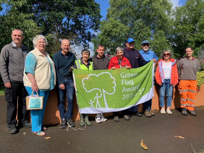 Members of the Friends of Page Park group and South Gloucestershire Council grounds maintenance team gather to celebrate the Green Flag Award.