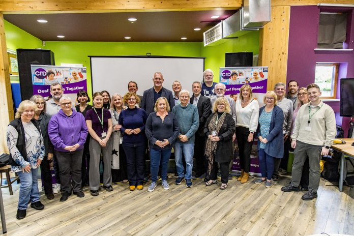 A group of people assembled at the launch event