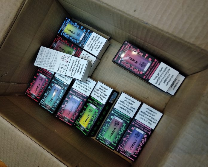 A box of seized vape devices