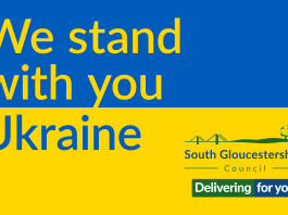 The colours of the Ukrainian flag with the wording We stand with you Ukraine