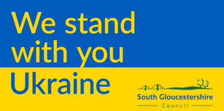 The colours of the Ukrainian flag with the wording We stand with you Ukraine
