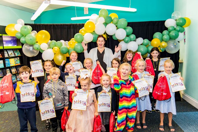 Councillor Rachael Hunt joins a group of children at Yate Library to celebrate everyone who took part in the Summer Reading Challenge.