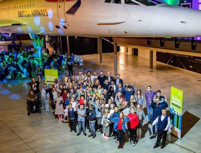 Children and young people gather for a group photo at the 2022 South Gloucestershire School Awards ceremony.