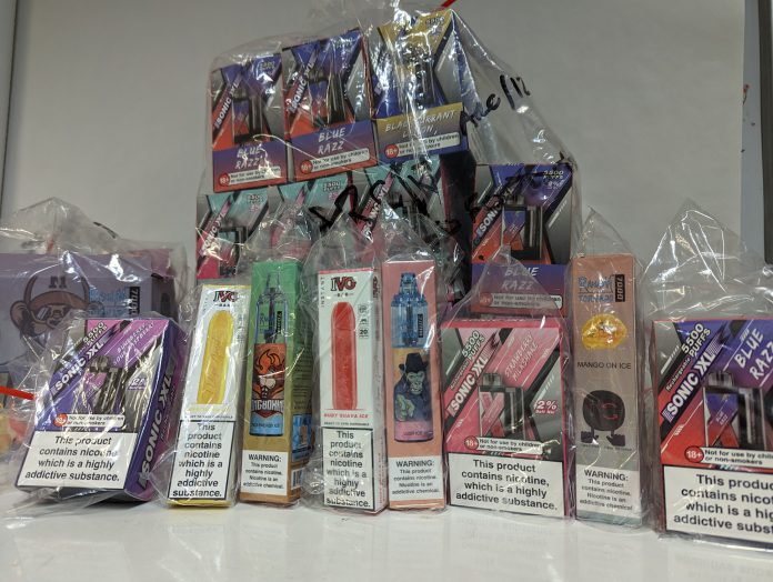 An image of a collection of seized e-cigarette products