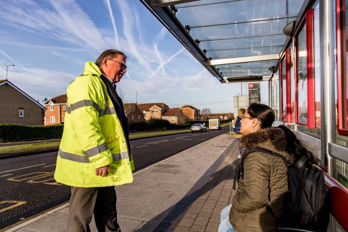 Cabinet Member, councillor Steve Reade talks to a bus passenger on Bradley Stoke Way about proposals to improve sustainable travel from Thornbury to Bradley Stoke