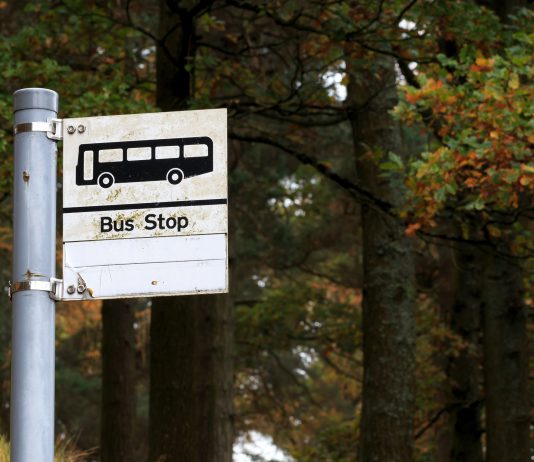 Black and white Bus stop sign