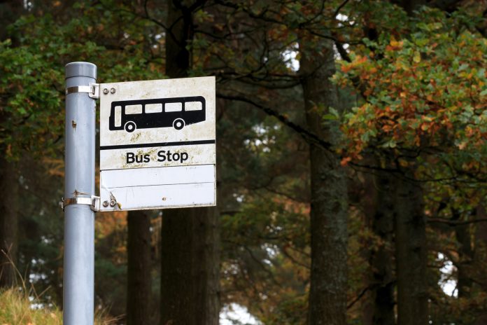 Black and white Bus stop sign