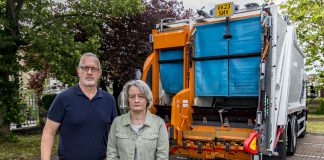 Cllr Ian Boulton and Cllr Claire Young stood near a recycling truck