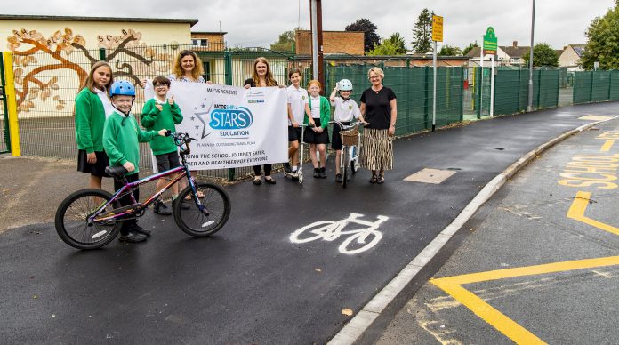 Councillor Louise Harris, Emily Harrison from the School Leadership Team, Active Travel Champion Beverley Furber and school children at The Ridge Juniors in Yate