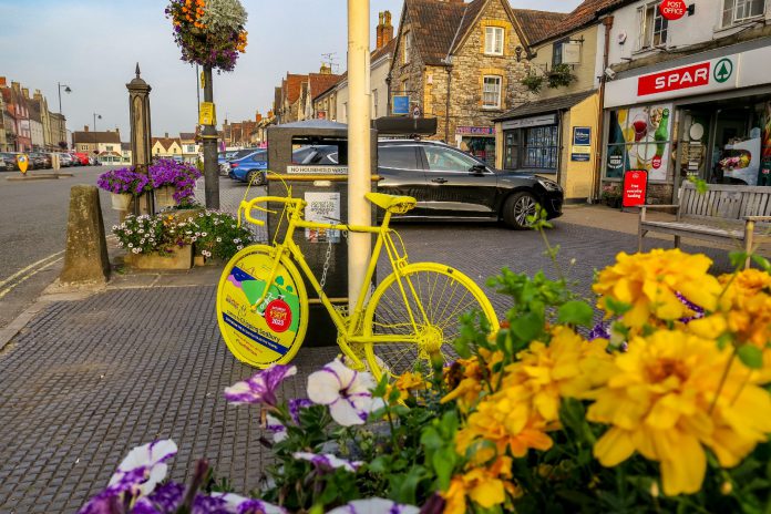 A yellow bike on the Tour of Britain route