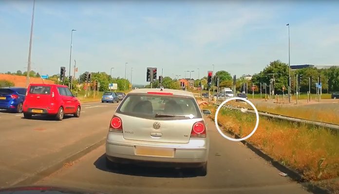 Litter being thrown from a vehicle