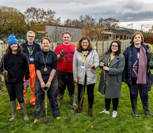 Councillor Louise Harris at a recent tree planting event with pupils from Warmley Park school