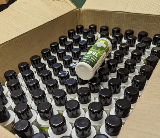 A box filled with bottles of seized fake hand sanitiser