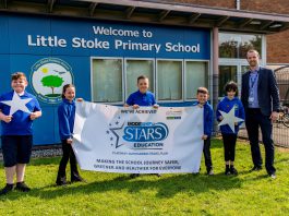 Chris Jelf, Deputy Head at Little Stoke Primary School with pupils from the school celebrating Modeshift STARS 'outstanding' accreditation.