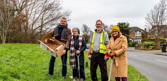 Common Connections officer David Tibbatts, Bobbie Sutherland and Paul Kearsley from Emersons Green Town Council, and Councillor Louise Harris at the bulb planting