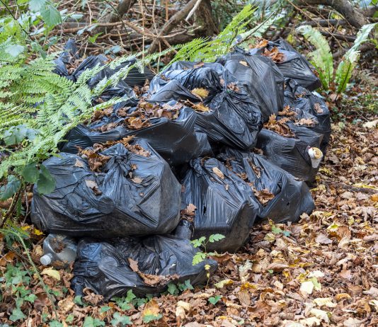 A stock image of black bin bags