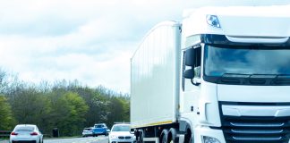 Traffic on a road including a lorry