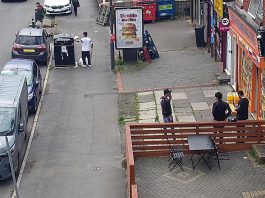 CCTV of waste being placed in a public bin