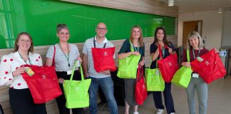 Councillor Alison Evans and council staff who helped put together the packs