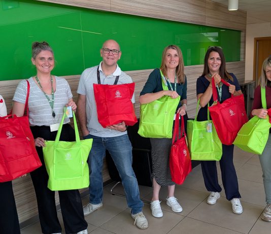 Councillor Alison Evans and council staff who helped put together the packs