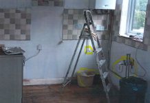 An empty kitchen after Brown ripped out the units