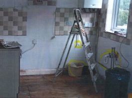 An empty kitchen after Brown ripped out the units