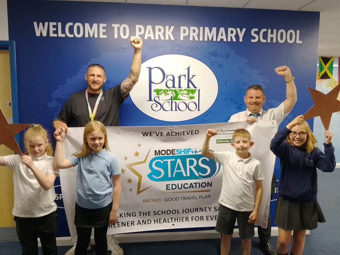 Children and staff from The Park Primary School in Kingswood celebrate their Modeshift STARS accreditation.