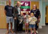 Chair of South Gloucestershire Council, councillor Katie Cooper (right) and Cabinet Member with responsibility for Libraries, councillor Sean Rhodes (second from left), are pictured with local children and a parent at Yate Library to celebrate the launch of the 2025 Summer Reading Challenge.