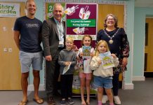 Chair of South Gloucestershire Council, councillor Katie Cooper (right) and Cabinet Member with responsibility for Libraries, councillor Sean Rhodes (second from left), are pictured with local children and a parent at Yate Library to celebrate the launch of the 2025 Summer Reading Challenge.
