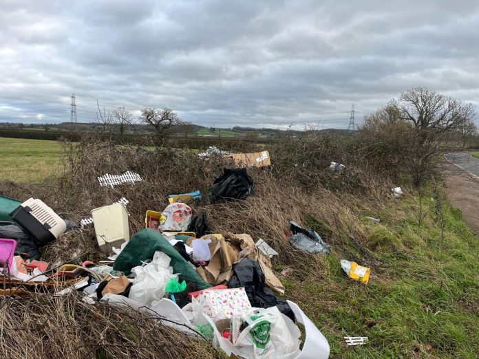 AustFlyTip Fly-tipped waste on a grass verge