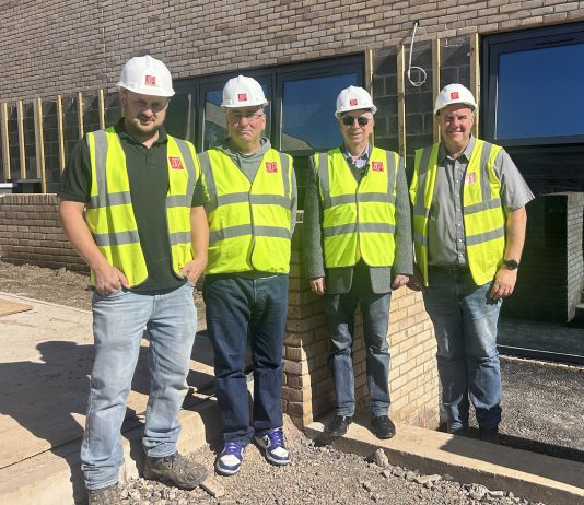 Ollie Begg, assistant site manager at John Perkins Construction, Cllr Adam Monk, cabinet member for resources, Dave Addison, chairman of Stoke Gifford Parish Council and Richard Mann, site manager John Perkins Construction