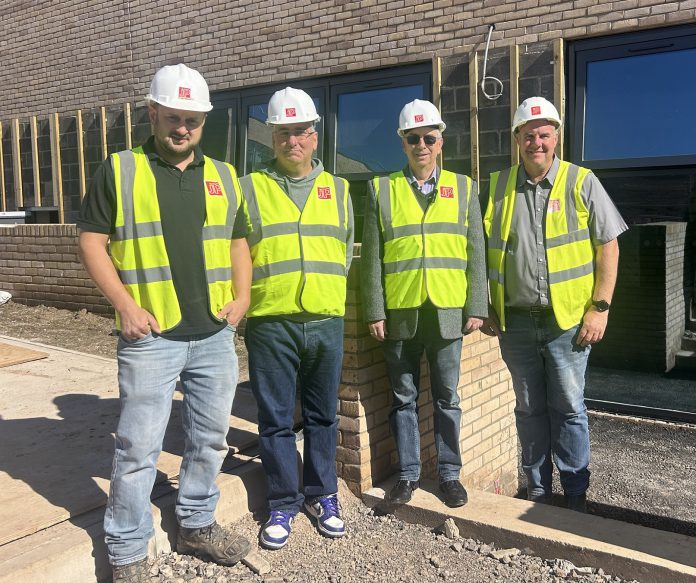 Ollie Begg, assistant site manager at John Perkins Construction, Cllr Adam Monk, cabinet member for resources, Dave Addison, chairman of Stoke Gifford Parish Council and Richard Mann, site manager John Perkins Construction