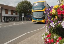 A bus travelling down Downend Road/Downend High STreet