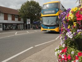 A bus travelling down Downend Road/Downend High STreet