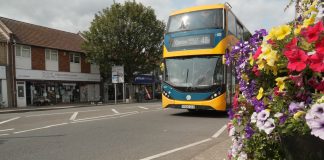 A bus travelling down Downend Road/Downend High STreet
