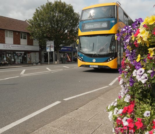 A bus travelling down Downend Road/Downend High STreet