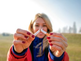 South West leaders unite: 15 councils urge immediate passage of historic tobacco bill A young woman snapping a cigarette in half