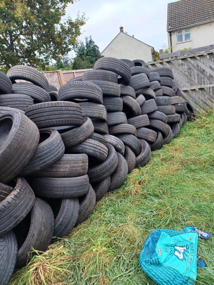 A large pile of tyres